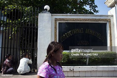 A released prisoner, right, is welcomed by her colleague after she was released from Insein Prison Sunday, Jan. 4, 2026, in Yangon, Myanmar. (AP Photo/Thein Zaw)