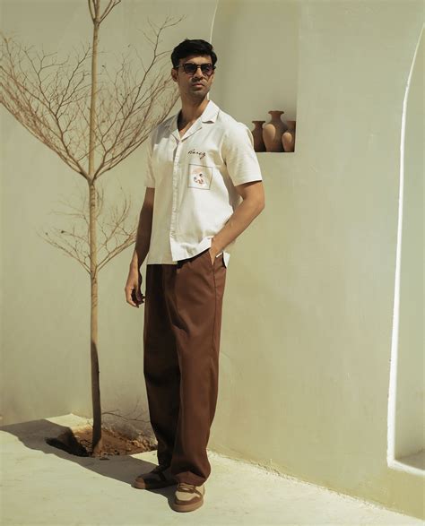 Rare Rabbit Men's Enzot Brown Cotton Plain Relaxed Fit Trouser