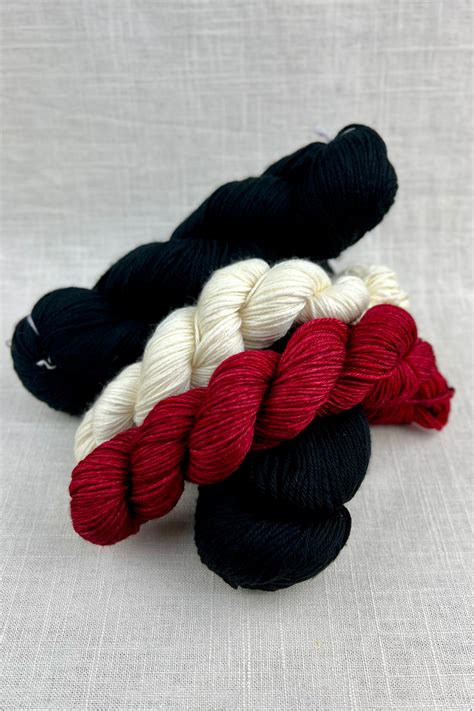 Malabrigo Arroyo - Black Cherry Tea Kit (black MC) – Unwind Yarn Studio