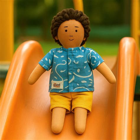 Raagu playing on a slide in a playground