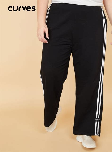 Buy Women Side Striped Sports Track Pants Online at just Rs. 999.0 ...