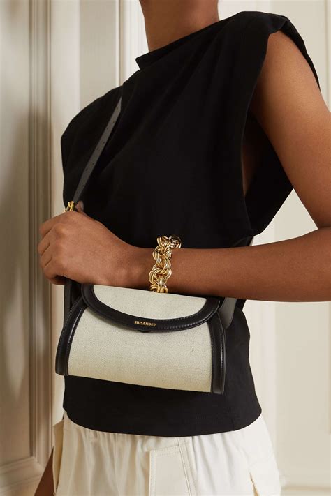 JIL SANDER Leather-trimmed canvas shoulder bag | NET-A-PORTER