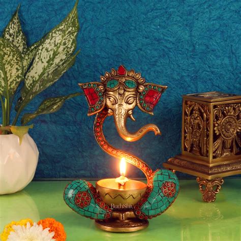 Buy Brass Abstract Ganesha Diya with Engraved Design and Stonework ...