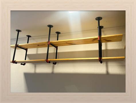 Custom built ceiling mounted shelves – Fossil's Cave