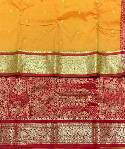 Mango Yellow Shade Saree with Golden and Red Border – Kumaran Silk