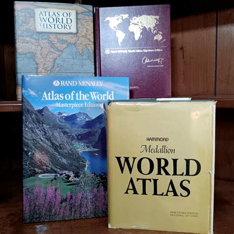 LOT 8: Set of 4 Vintage World Atlas Books | EstateSales.org
