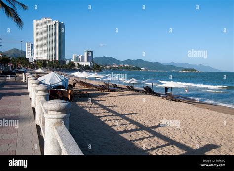 Photograph of Nha Trang beach with many high rise buildings behind it