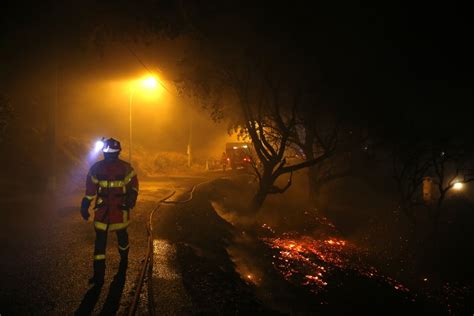 Photos: Wildfires rage through forests in southern France and Corsica ...