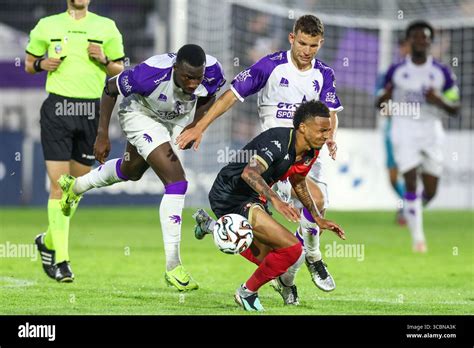 Beerschot's Ayouba Kosiah, Beerschot's Lukas Van Eenoo and Seraing's ...