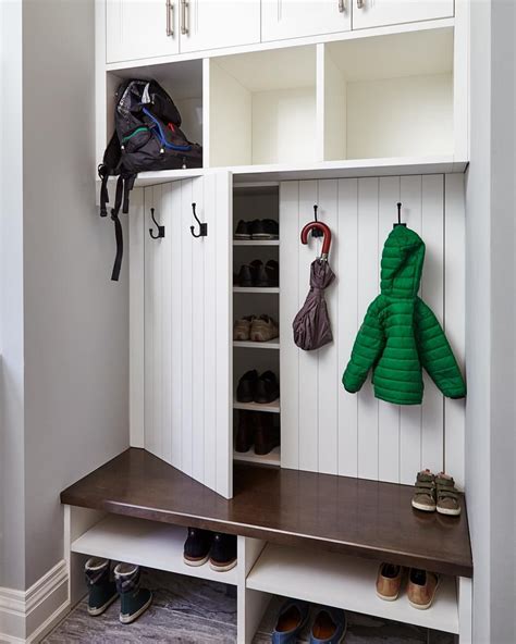 Our creative mudroom design features hidden shoe storage cabinets ...