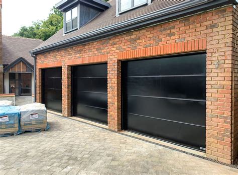 3x Hormann LPU42 L-Ribbed Insulated Sectional Garage Doors in Black