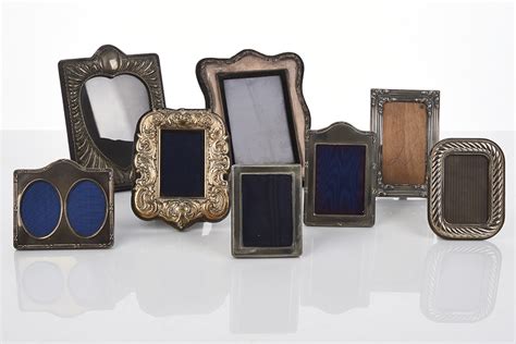 Collection of Silver Picture Frames - Shapiro Auctioneers