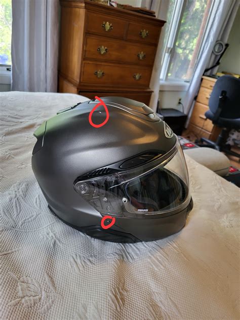 Recently bought a new HJC RPHA91 inTitanium and after less than a month of riding it has chips ...