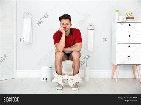 Young Man Sitting On Image & Photo (Free Trial) | Bigstock