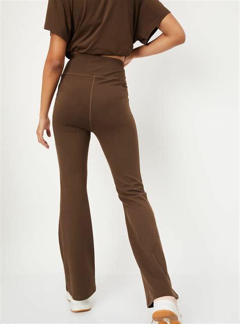 Buy Women Solid Flared Sports Track Pants Online at just Rs. 999.0 ...