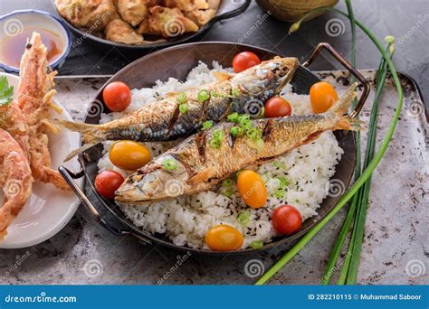 Crispy Delight: Deep Fried Fish Over Fluffy White Steamed Rice in 4K ...