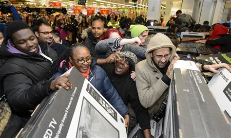 Black Friday UK: shoppers fight for bargains - live - Retail news ...