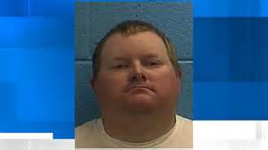 Son charged after mother found in rotting, trash-filled home