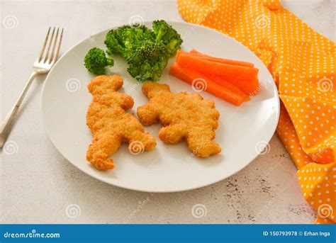 Kids Food. Nuggets with Vegetables. Dinosaur Shaped Chicken, Fish or ...