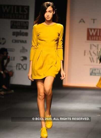 Pia Trivedi presents a creation by designer Atsu Sekhose during Wills ...