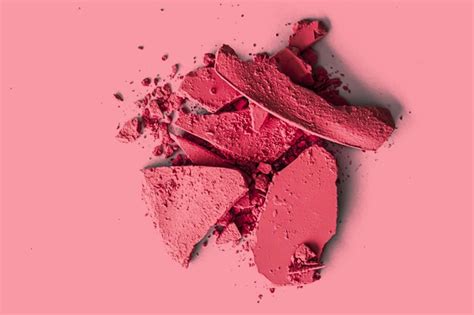 Red eye shadow powder as makeup palette closeup crushed cosmetics and ...