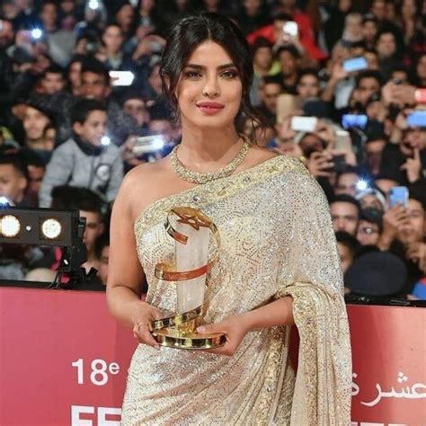 Priyanka Chopra in sequined ivory saree and strapless blouse looks like ...