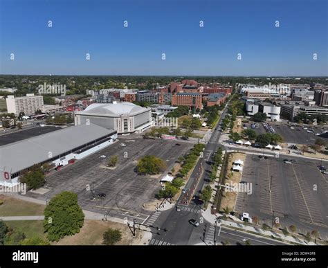Aerial view of the expansive gray parking lot, the distinctive Value City Arena at The ... - capacity of value city arena
