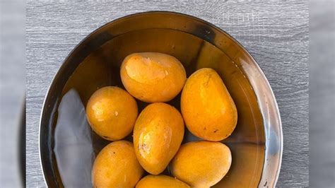 mangoes should be soak in water before eat, আম খাওয়ার আগে জলে ভিজিও ...