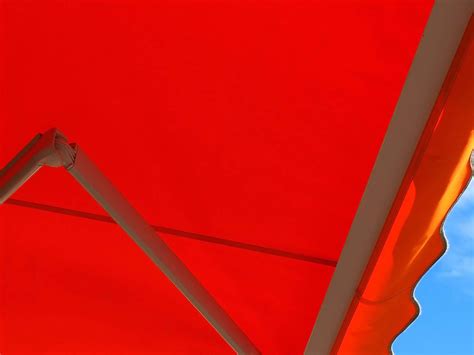 Retractable Awnings: The Pros and Cons - Carroll Architectural Shade