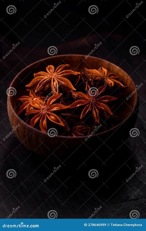 Star Shaped Spice Star Anise in a Wooden Round Bowl Stock Image - Image ...