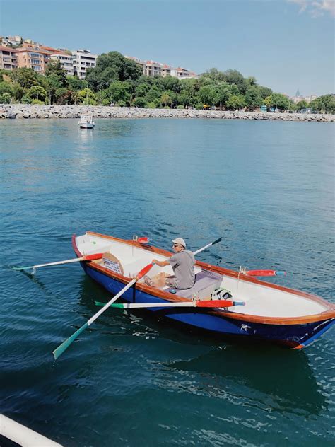 Top Angle View Man With Boat In Oceanman With Boat Of Town Photos, Download The BEST Free Top ...