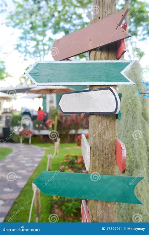 Blank wood Signs in garden stock image. Image of travel - 47397911