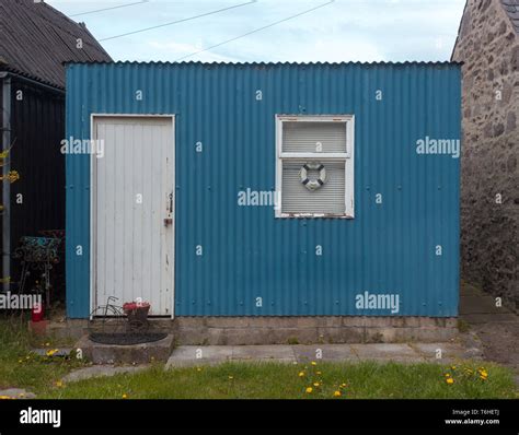 Little Blue House Stock Photo - Alamy