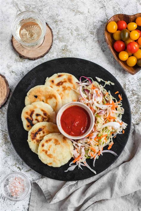 Pupusas, the national dish of El Salvador, is a simple and affordable ...