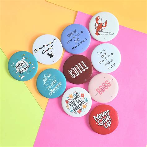 IMI Studios Never GIVE UP Set of 10 Badges Combo : Amazon.in: Toys & Games