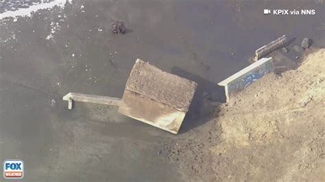 Raw video: WWII-era military structure falls onto beach in California ...