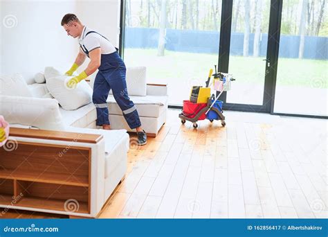 Cleaner Male Cleaning Leather Sofa Stock Image - Image of electrical ...