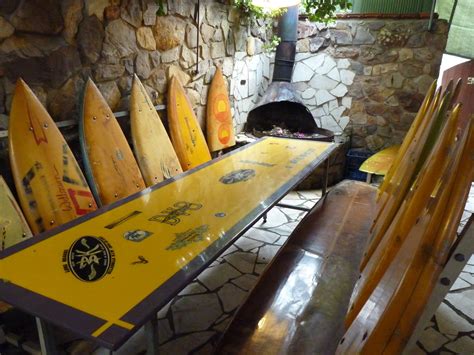 Tables & chairs made out of surfboards - restaurant on the Central ...