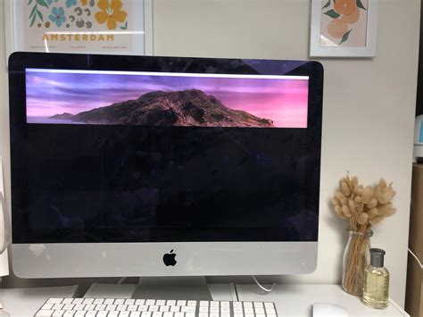 Glitching iMac. Something was left across the keyboard and then it ...
