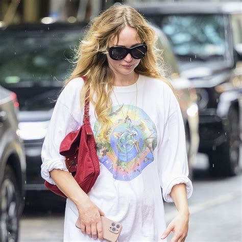 Jennifer Lawrence Pulls Off a Caped T-Shirt and Trousers at a Film Festival in SpainJennifer ...