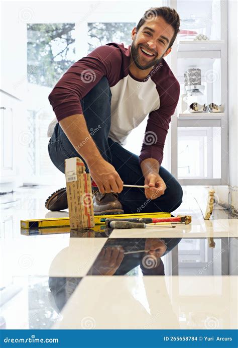 Taking on this DIY Project One Tile at a Time. Portrait of a Smiling ...