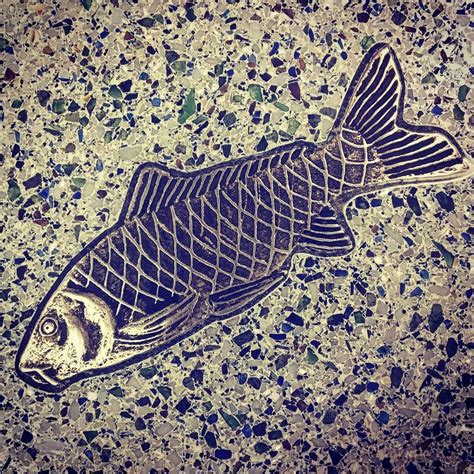Metal Fish Inlaid Terrazzo Floor at Seattle-Tacoma Airport