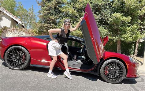 January Jones back in bikini after 'NASCAR rebranding'