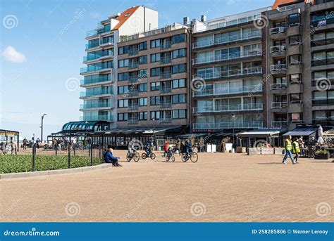 Knokke Heist, Flemish Region - Belgium - People Walking Along the Coastline at the Editorial ...