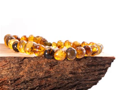 5 Benefits of Wearing Genuine Baltic Amber Jewelry - Powell's Owls