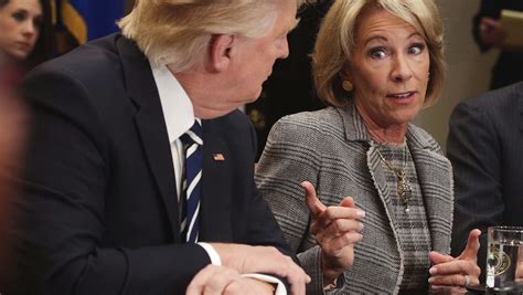 Trump orders DeVos to get rid of 'overreaching mandates' in schools