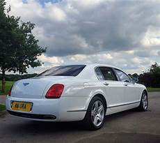 White Bentley by White Bentley Flying Spur Hire White Bentley