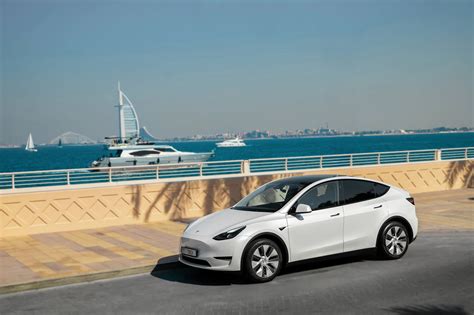 Rent Tesla Model Y White in Dubai - Electric - Octane.Rent