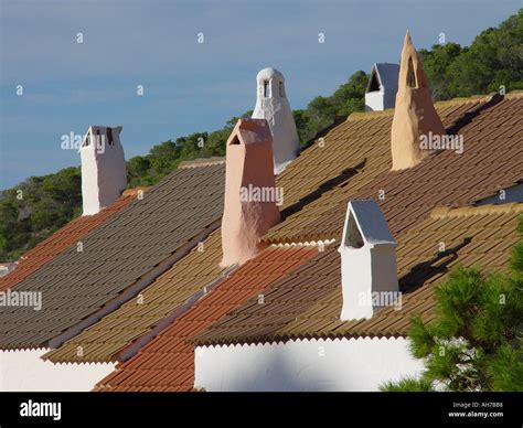 chimneys on spanish rooftops in the Balearic island of Ibiza Stock ...