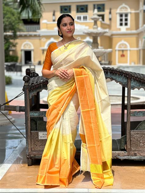 Southloom Tie & Dye Multi Colour Yellow and Orange Tissue Kasavu Saree ...